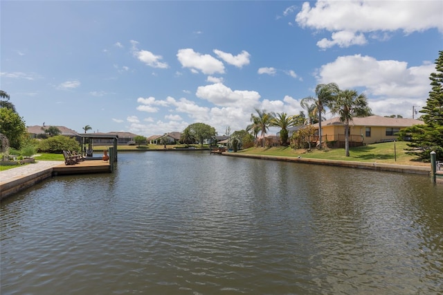 property view of water with a residential view and a boat dock