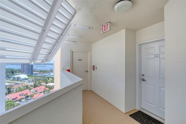 2937 S Atlantic Ave Unit 2001, Daytona Beach, FL 32118 - view of exterior entry with a balcony