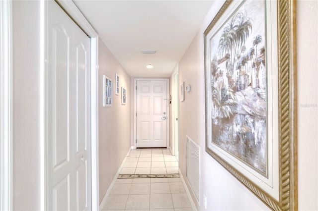 2937 S Atlantic Ave Unit 2001, Daytona Beach, FL 32118 - hall featuring light tile patterned floors, baseboards, and visible vents