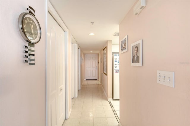 2937 S Atlantic Ave Unit 2001, Daytona Beach, FL 32118 - hall with recessed lighting, baseboards, light tile patterned floors, and visible vents