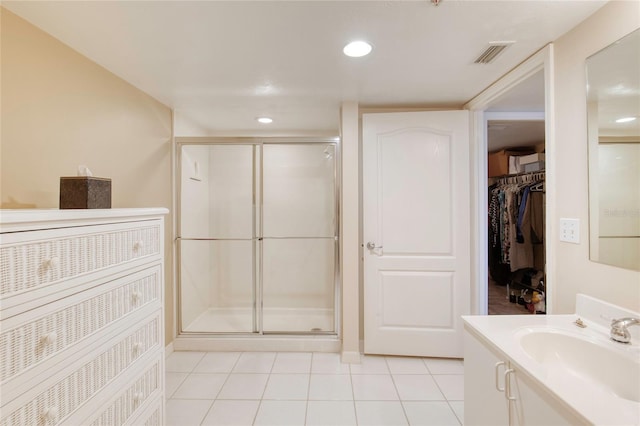 2937 S Atlantic Ave Unit 2001, Daytona Beach, FL 32118 - full bath featuring tile patterned floors, vanity, visible vents, and a shower stall