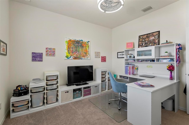 carpeted home office featuring baseboards and visible vents