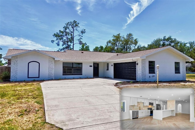 104 Foxhall Ln, Palm Coast, FL 32137 - ranch-style house featuring driveway, stucco siding, a garage, and roof with shingles