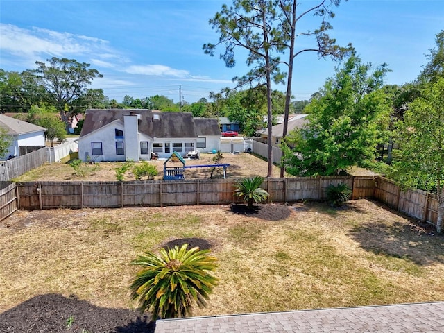 104 Foxhall Ln, Palm Coast, FL 32137 - fenced backyard with a patio