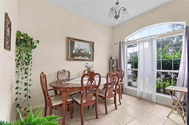 237 N Hidden Tree Dr, Saint Augustine, FL 32086 - dining area with a chandelier and light tile patterned flooring