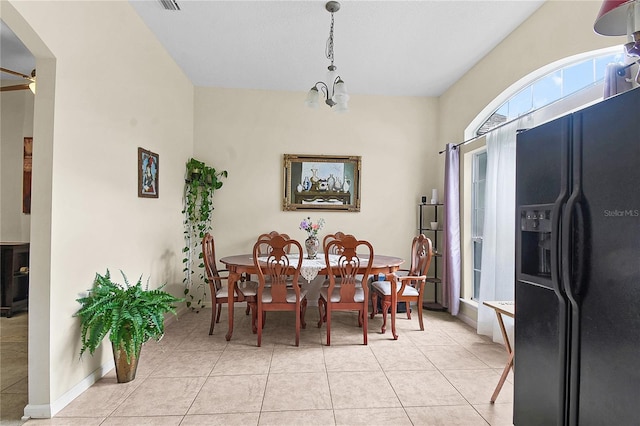 237 N Hidden Tree Dr, Saint Augustine, FL 32086 - dining area featuring light tile patterned floors and arched walkways