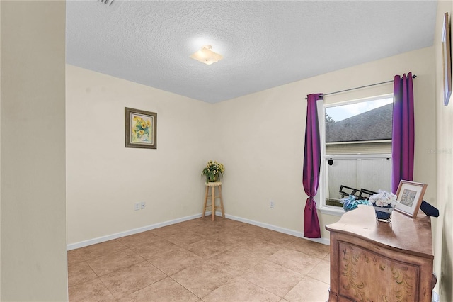 237 N Hidden Tree Dr, Saint Augustine, FL 32086 - office featuring a textured ceiling and light tile patterned flooring