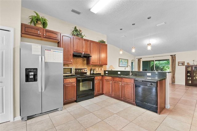 237 N Hidden Tree Dr, Saint Augustine, FL 32086 - kitchen with black appliances, under cabinet range hood, dark countertops, a peninsula, and decorative backsplash