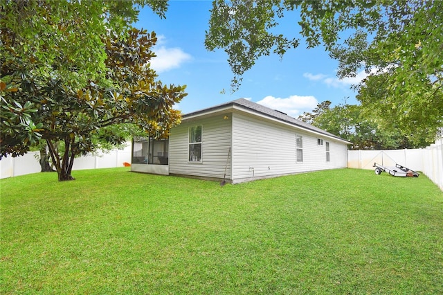 237 N Hidden Tree Dr, Saint Augustine, FL 32086 - back of house with a sunroom and a fenced backyard