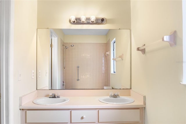 14 Post Oak Ln, Palm Coast, FL 32164 - bathroom featuring double vanity and a tile shower
