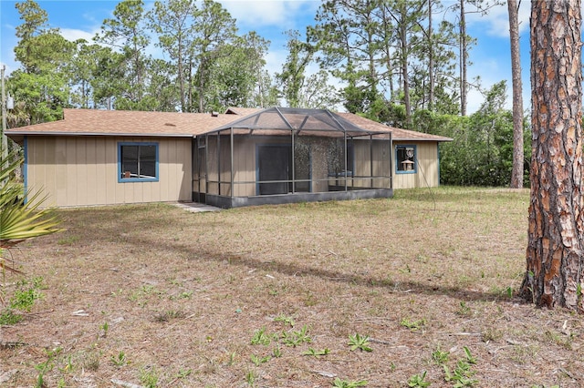 14 Post Oak Ln, Palm Coast, FL 32164 - rear view of house featuring a lanai and a yard