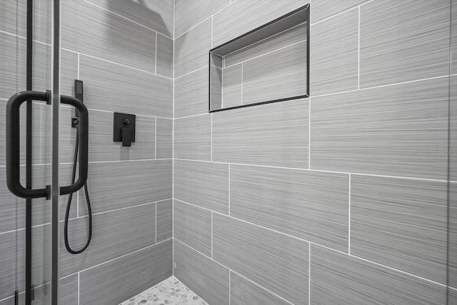 full bathroom featuring a stall shower