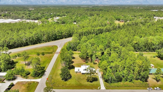 bird's eye view featuring a view of trees