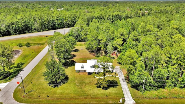 drone / aerial view with a forest view