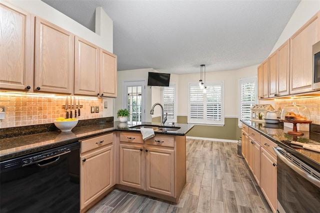 49 Louisiana Dr, Palm Coast, FL 32137 - kitchen featuring black dishwasher, a sink, stainless steel range with electric cooktop, light brown cabinets, and a textured ceiling