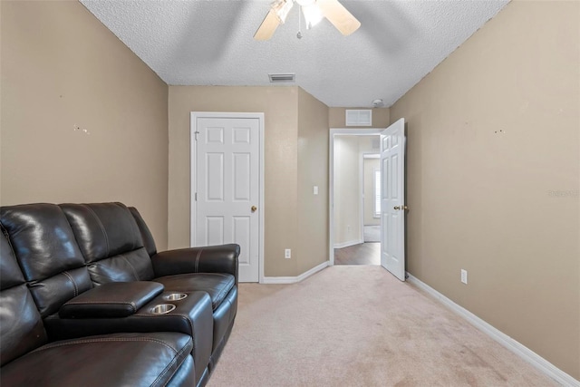 49 Louisiana Dr, Palm Coast, FL 32137 - sitting room with light colored carpet, baseboards, a textured ceiling, and a ceiling fan