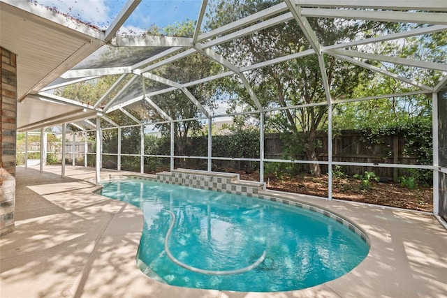 49 Louisiana Dr, Palm Coast, FL 32137 - view of pool featuring a fenced backyard, a patio area, and a lanai