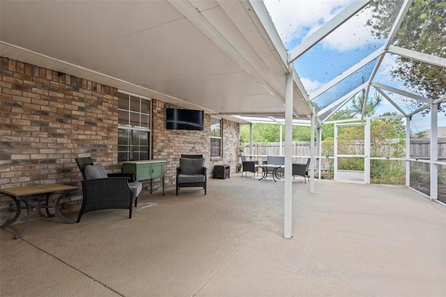 49 Louisiana Dr, Palm Coast, FL 32137 - view of patio featuring fence and a lanai