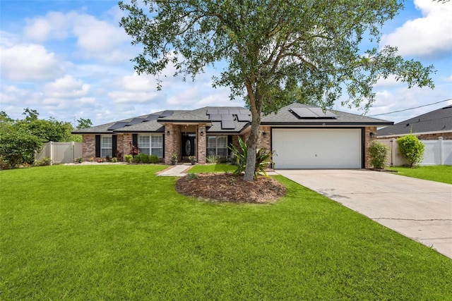 49 Louisiana Dr, Palm Coast, FL 32137 - view of front of home featuring concrete driveway, an attached garage, solar panels, brick siding, and a shingled roof