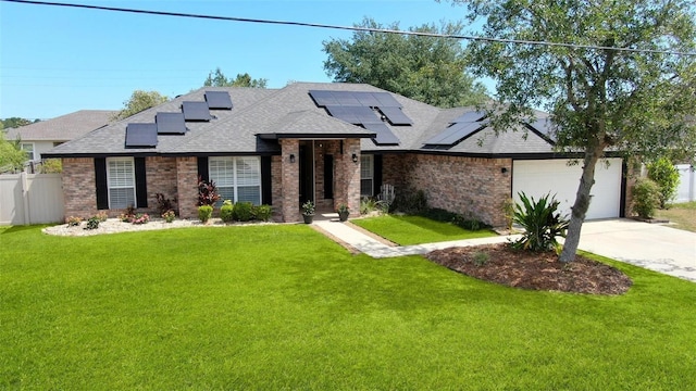 49 Louisiana Dr, Palm Coast, FL 32137 - view of front of property with roof with shingles, brick siding, concrete driveway, roof mounted solar panels, and a garage