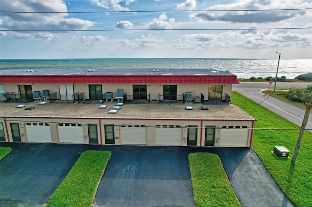 1601 N Ocean Shore Blvd, Flagler Beach, FL 32136 - view of front of home with a water view