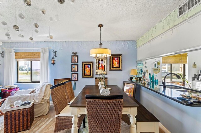 1601 N Ocean Shore Blvd, Flagler Beach, FL 32136 - dining space with a textured ceiling
