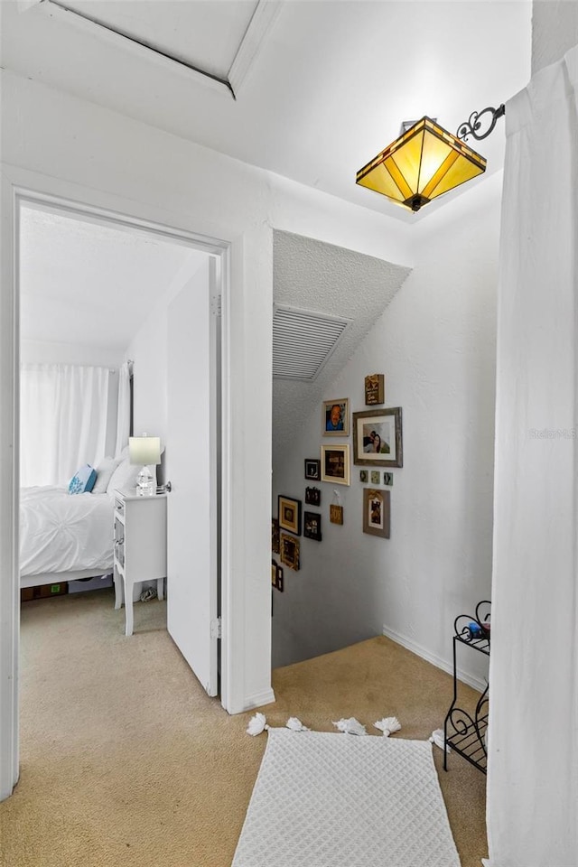 1601 N Ocean Shore Blvd, Flagler Beach, FL 32136 - hallway with carpet flooring and baseboards