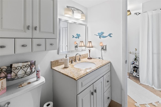 1601 N Ocean Shore Blvd, Flagler Beach, FL 32136 - full bath featuring vanity, toilet, and a shower with shower curtain