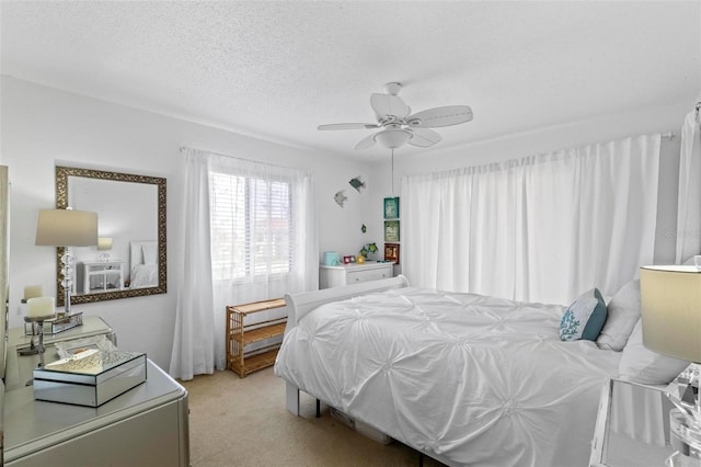 1601 N Ocean Shore Blvd, Flagler Beach, FL 32136 - carpeted bedroom featuring ceiling fan and a textured ceiling