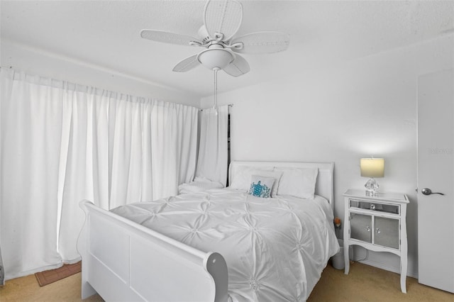 1601 N Ocean Shore Blvd, Flagler Beach, FL 32136 - carpeted bedroom featuring a ceiling fan