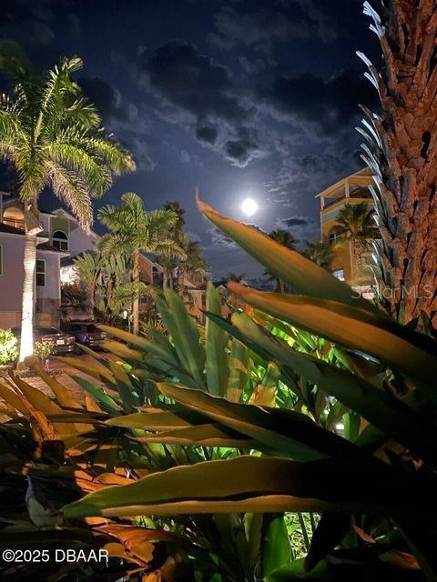 3000 Ocean Shore Blvd Unit 150, Ormond Beach, FL 32176 - view of balcony at twilight