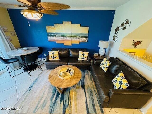 3000 Ocean Shore Blvd Unit 150, Ormond Beach, FL 32176 - tiled living room with ceiling fan