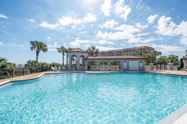 22 San Carlos Dr, Palm Coast, FL 32137 - community pool featuring fence and a patio