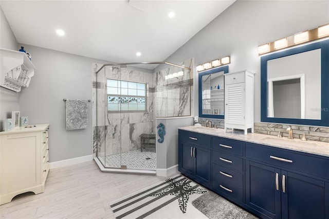 22 San Carlos Dr, Palm Coast, FL 32137 - full bath featuring a stall shower, double vanity, baseboards, wood finished floors, and recessed lighting