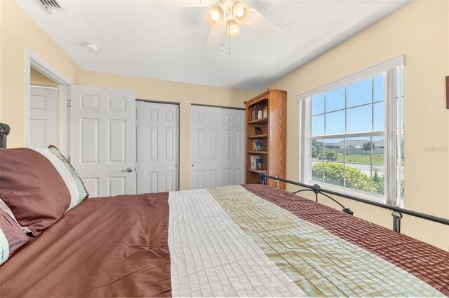 22 San Carlos Dr, Palm Coast, FL 32137 - bedroom with two closets and ceiling fan