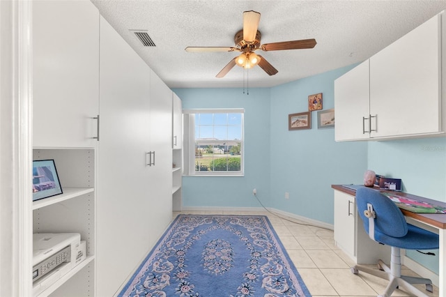 22 San Carlos Dr, Palm Coast, FL 32137 - office with a textured ceiling, ceiling fan, and light tile patterned flooring