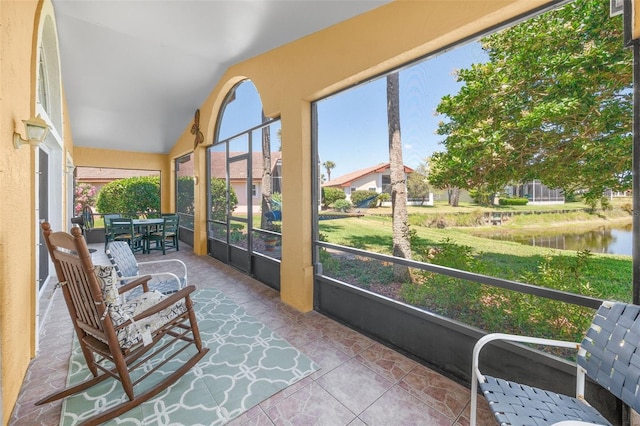 22 San Carlos Dr, Palm Coast, FL 32137 - sunroom / solarium featuring a water view and lofted ceiling