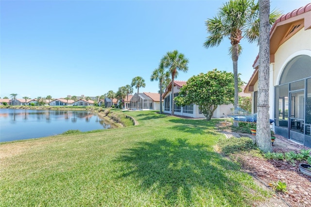 22 San Carlos Dr, Palm Coast, FL 32137 - view of grassy yard featuring a water view and a residential view