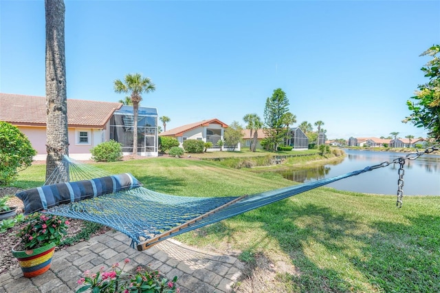 22 San Carlos Dr, Palm Coast, FL 32137 - view of property's community featuring a yard, a water view, and a residential view