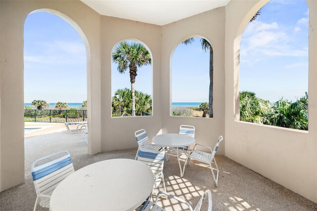 22 San Carlos Dr, Palm Coast, FL 32137 - view of patio / terrace featuring outdoor dining area, a water view, and fence