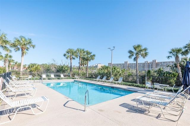 22 San Carlos Dr, Palm Coast, FL 32137 - community pool with fence and a patio area