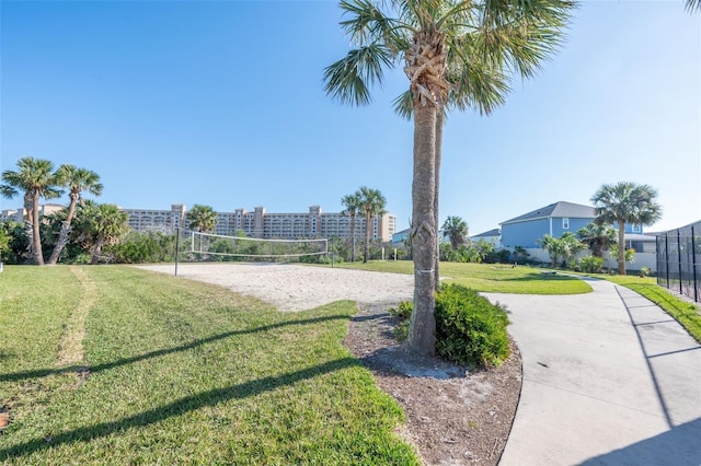 22 San Carlos Dr, Palm Coast, FL 32137 - surrounding community featuring volleyball court and a yard
