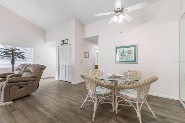 50 Nantucket Dr, Palm Coast, FL 32137 - dining space featuring high vaulted ceiling, baseboards, wood finished floors, and a ceiling fan
