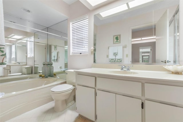 50 Nantucket Dr, Palm Coast, FL 32137 - bathroom featuring toilet, a garden tub, a stall shower, and vanity