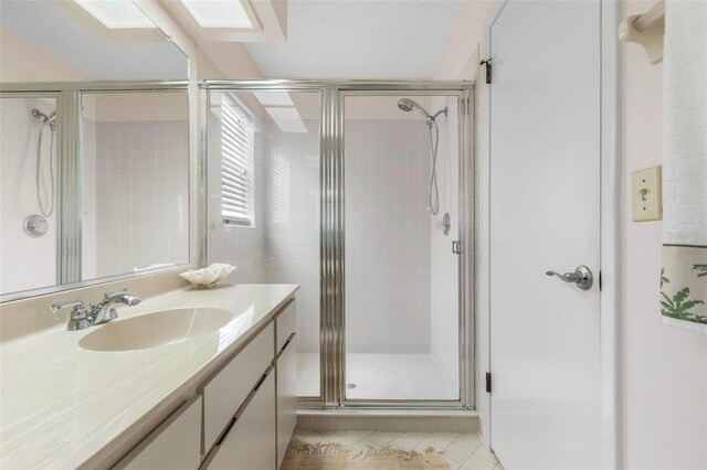 50 Nantucket Dr, Palm Coast, FL 32137 - full bath with tile patterned floors, a stall shower, and vanity