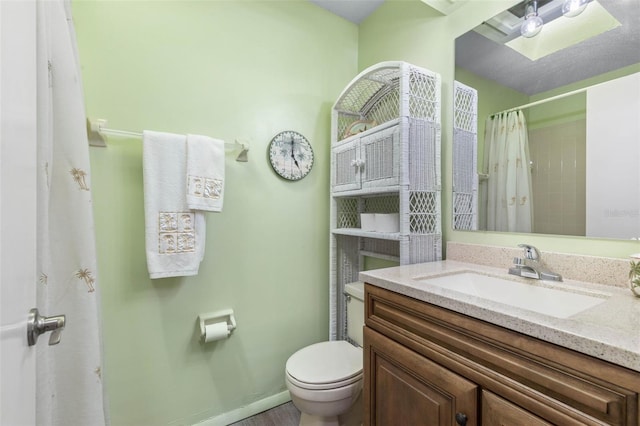 50 Nantucket Dr, Palm Coast, FL 32137 - bathroom with toilet, vanity, and a shower with shower curtain