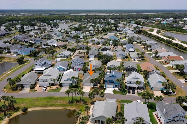 50 Nantucket Dr, Palm Coast, FL 32137 - aerial perspective of suburban area with a nearby body of water