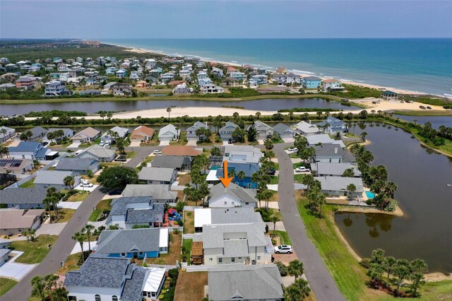 50 Nantucket Dr, Palm Coast, FL 32137 - aerial view of property and surrounding area featuring a large body of water and nearby suburban area