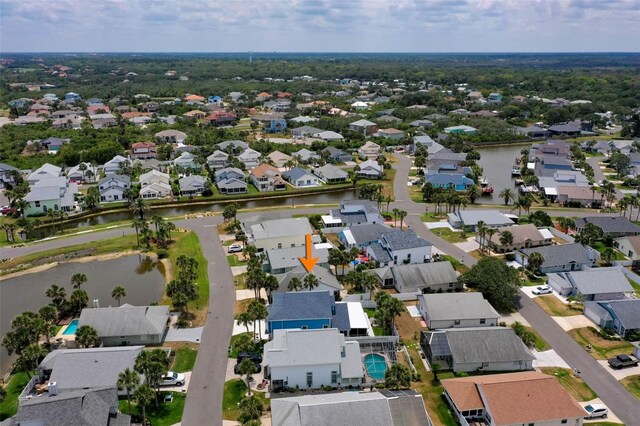 50 Nantucket Dr, Palm Coast, FL 32137 - aerial view of property and surrounding area with nearby suburban area and a nearby body of water