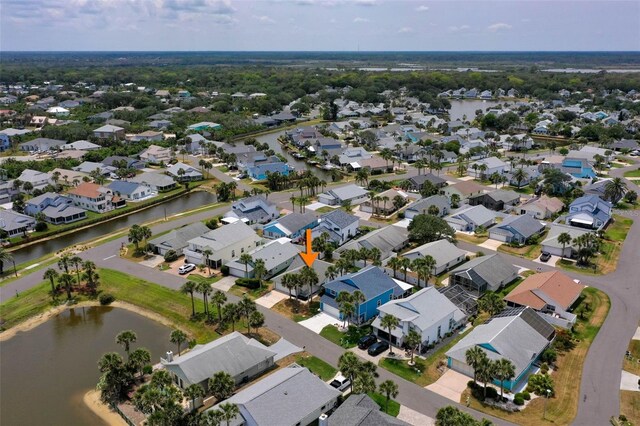 50 Nantucket Dr, Palm Coast, FL 32137 - aerial view of property and surrounding area with a nearby body of water and nearby suburban area